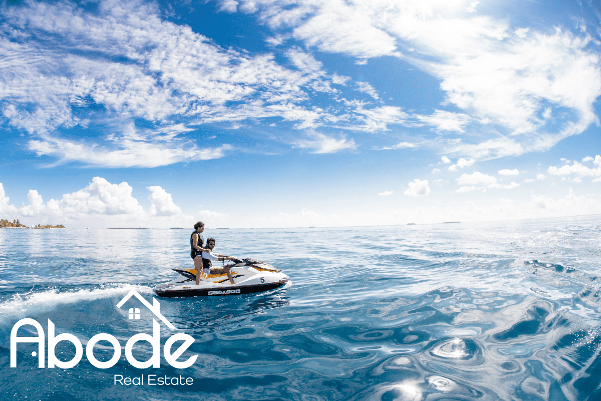 A jet ski speeding over the blue waters of Lauderdale By The Sea, FL.